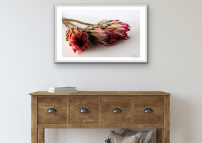 Mock-ups are a non-functional design, usually in the form of a digital image, to give customers an idea of what the final product will look like in a live setting. It is a realistic visual representation of a product, in this case a wall hanging or home decor.